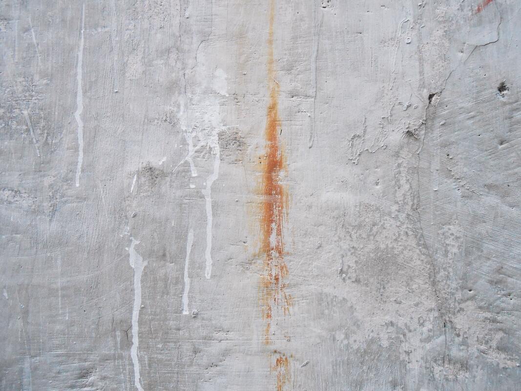 An oil stain on a concrete surface