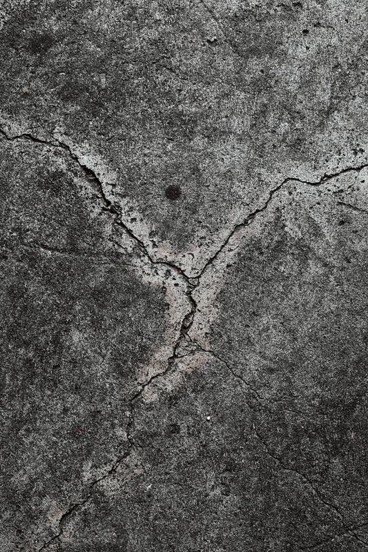 A broken concrete slab requires repair